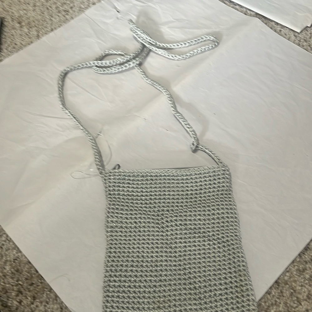 Ladies small knitted side bag, can be worn cross the body. Good material!